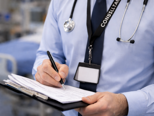 Consultant reviewing notes